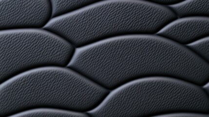 Obraz premium Dark Leather Texture Background with Wavy Pattern and Subtle Lighting