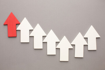 Colorful bar graph with arrow pointing upwards. Business, market growth and progress concept.