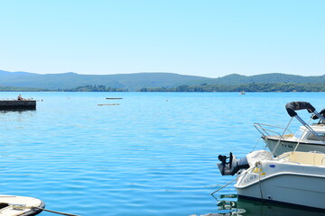Tivat Montenegro 05052024 A walk through the luxury marina Porto Montenegro, luxury houses, luxury yachts, vacation at sea. On a hot, sunny, spring afternoon.