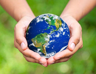 Hands gently holding the Earth represent stewardship and the global responsibility for environmental protection.