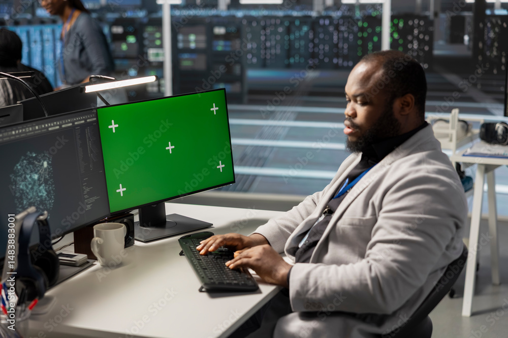 Poster data center engineer analyzing software logs metrics on green screen mockup pc, optimizing storage s