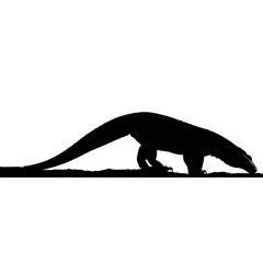Solid black silhouette of a Komodo dragon eating