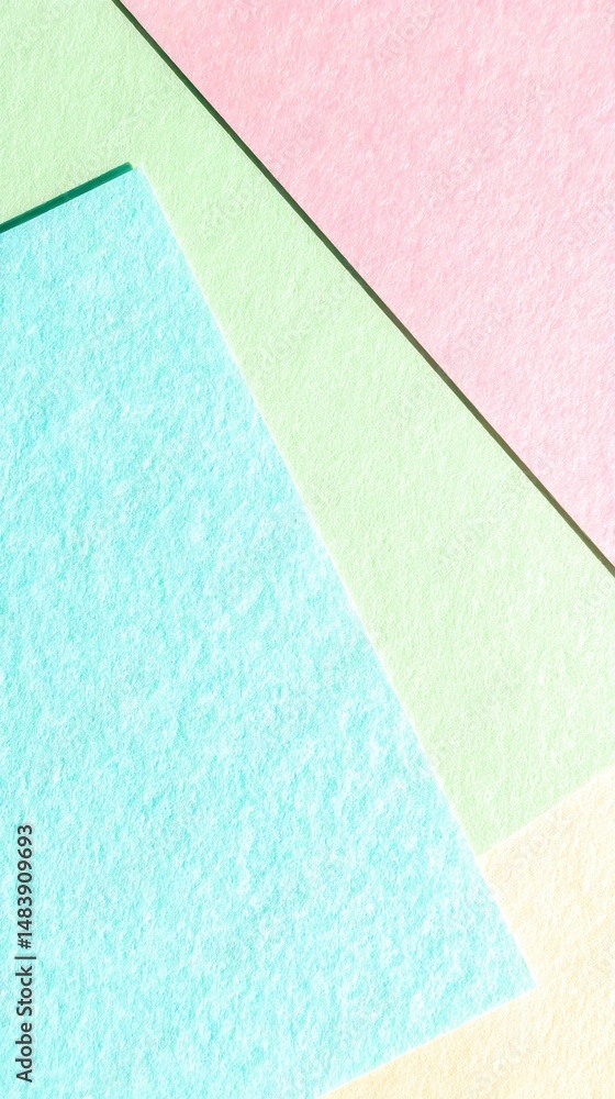 Poster abstract composition of soft textured colored paper sheets in pastel tones for creative and artistic