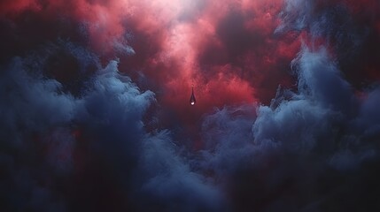 Obraz premium Single Water Drop Falling Through Dark Red Blue Cloudscape