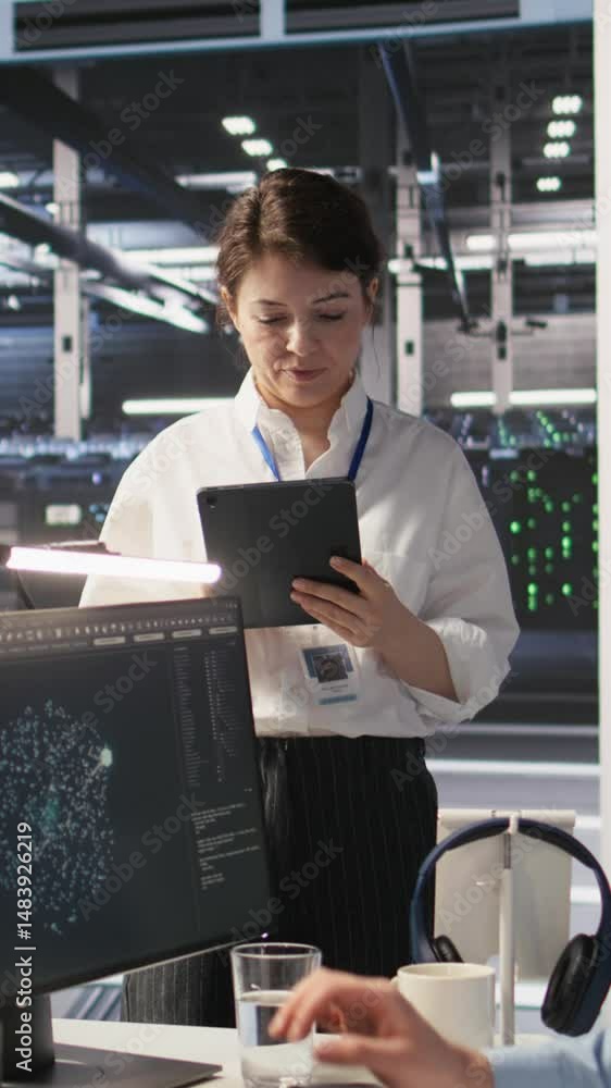 Poster vertical video server hub supervisor overseeing data scientist examining neural network algorithm on