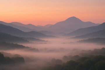 Pink sky over mountain range at dawn.