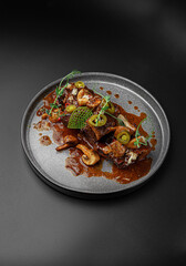 Dish with Red Wine Jus and Fresh Thyme