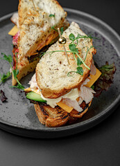 Tall Sandwich Cut and Served with Style