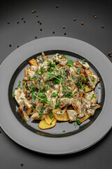 Herb Garnished Mushroom Cream Pasta Meal