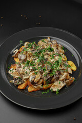 Black Plate with Mushrooms, Cream and Potatoes
