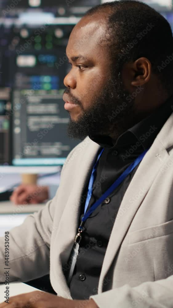 Poster vertical video cheerful data center admin pleased after finalizing neural network software build upg