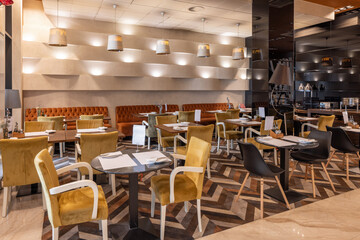 Stylish modern restaurant interior with cozy seating