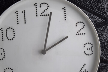 Focus time in clock of two o'clock for design in your business concept isolated on black background