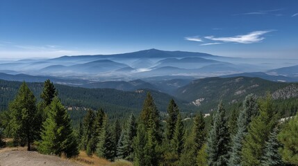 Fototapeta premium Serene mountain range partially obscured by swirling smoke, peaceful ambiance - silhouette sky environment mountain