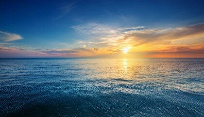 calm colored sea and sky at sunset