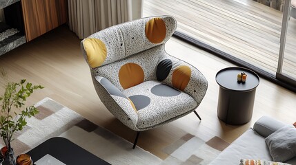 Cosy living room chair featuring playful design elements captured above with a modern table nearby