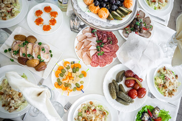 Delicious dishes on the table in the restaurant. Wedding, Banquet. Serving table