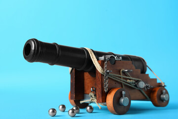 Toy model of cannon on blue background