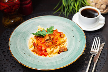 Tagliatelle with meat tomato sauce and coffee. Delicious tagliatelle pasta served with a rich...