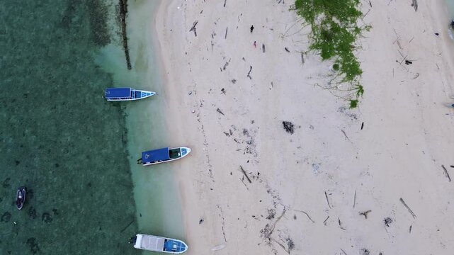 Crystal Waters and Reef Shoreline of Kodingareng Keke Island