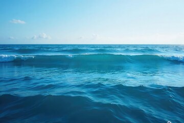 Obraz premium Vast expanse of deep blue ocean water, waves gently rolling under a clear sky Perfect for travel, nature, or environmental themes , water, coastal