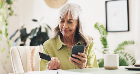 Phone, credit card and mature woman in home for online shopping or ecommerce order with sale. Relax, cellphone and female person with banking app for payment, transaction or deposit in house.