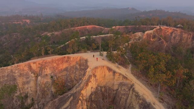 Sunrise breaks over dry canyon curves in northern Thailand, Thailand Aerial drone video