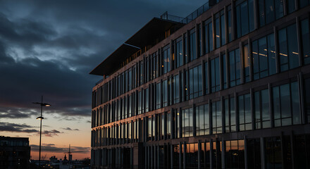 Fototapeta premium Modern Glass Office Building Sunset Dusk