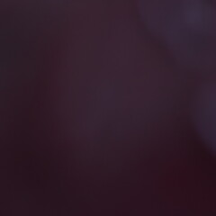 Dark maroon soft blur background, great for moody, elegant, or artistic design projects.