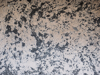 Textured Grey and Beige Wall with Unique Patterns