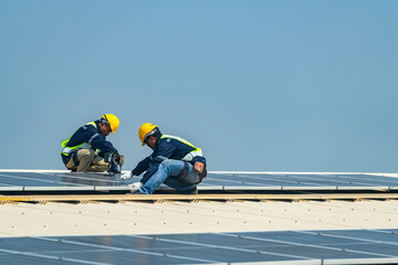 team of professionals installs solar panels, ensuring energy efficiency and sustainable...
