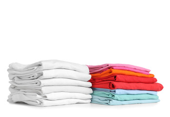 Stacks of clean clothes isolated on white background