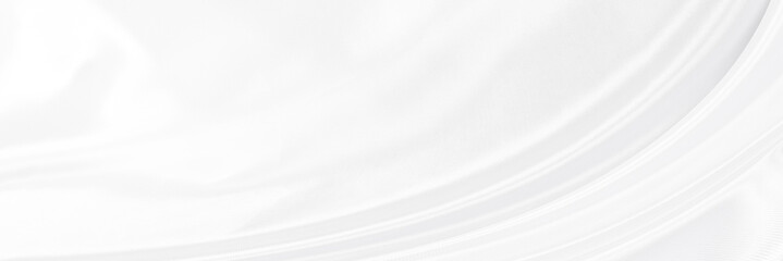 White gray satin texture that is white silver fabric silk panorama background with beautiful soft...