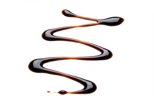Balsamic glaze swirl on white background, culinary decoration
