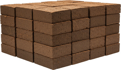 Obraz premium Stack of Brown Coir Bricks Organic Growing Medium Horticulture Supplies