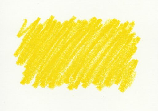 Yellow crayon scribble on white paper, creating a textured background