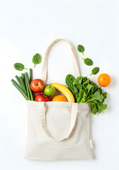 Healthy food in tote bag organic fresh produce fruits vegetables grocery shopping zero waste lifestyle concept