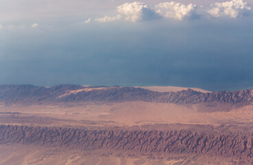 Aerial view of the mountains and sandy plateau of Egypt, the Sinai Peninsula, the Red Sea. Aerial photography.