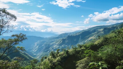 Naklejka premium Scenic Mountain Landscape Under A Bright Blue Sky And White Clouds
