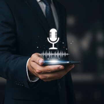 Businessman Using Voice Recognition Technology on Smartphone