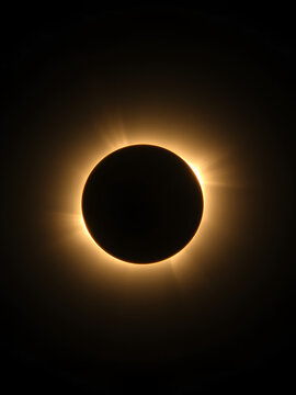 Solar eclipse detail, 800mm solar telescope lens view, corona and prominence details visible, some noise.