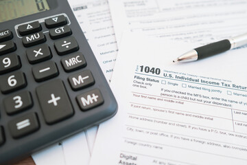 Form 1040, United States Tax forms background for individual tax return. Business and Tax concept.