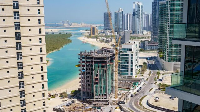 Waterfront construction project on Al Reem Island in Abu Dhabi, United Arab Emirates - time lapse