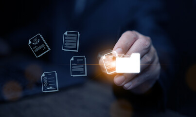 Document Management System concept. A man drags and drops files into DMS software to store, share, track and manage files or documents.