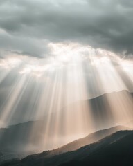 Stunning landscape featuring rays of light breaking through clouds.
