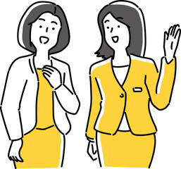 笑顔で案内する2人の女性