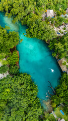 Aerial top down view of the pristine aqua blue waters of Blue Lagoon in Port Vila.