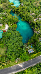 A beautiful tropical lagoon is seen next to a local highway in Vanuatu.