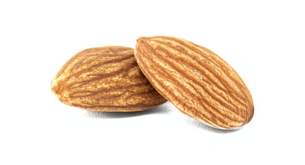Two almonds, showcasing their textured surfaces and natural brown color, sit on a white background.