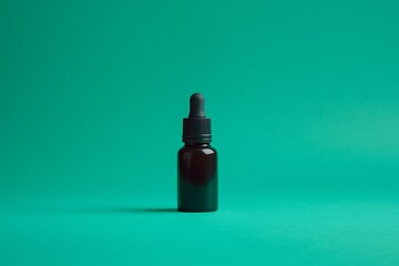Minimalist serum bottle on teal background
